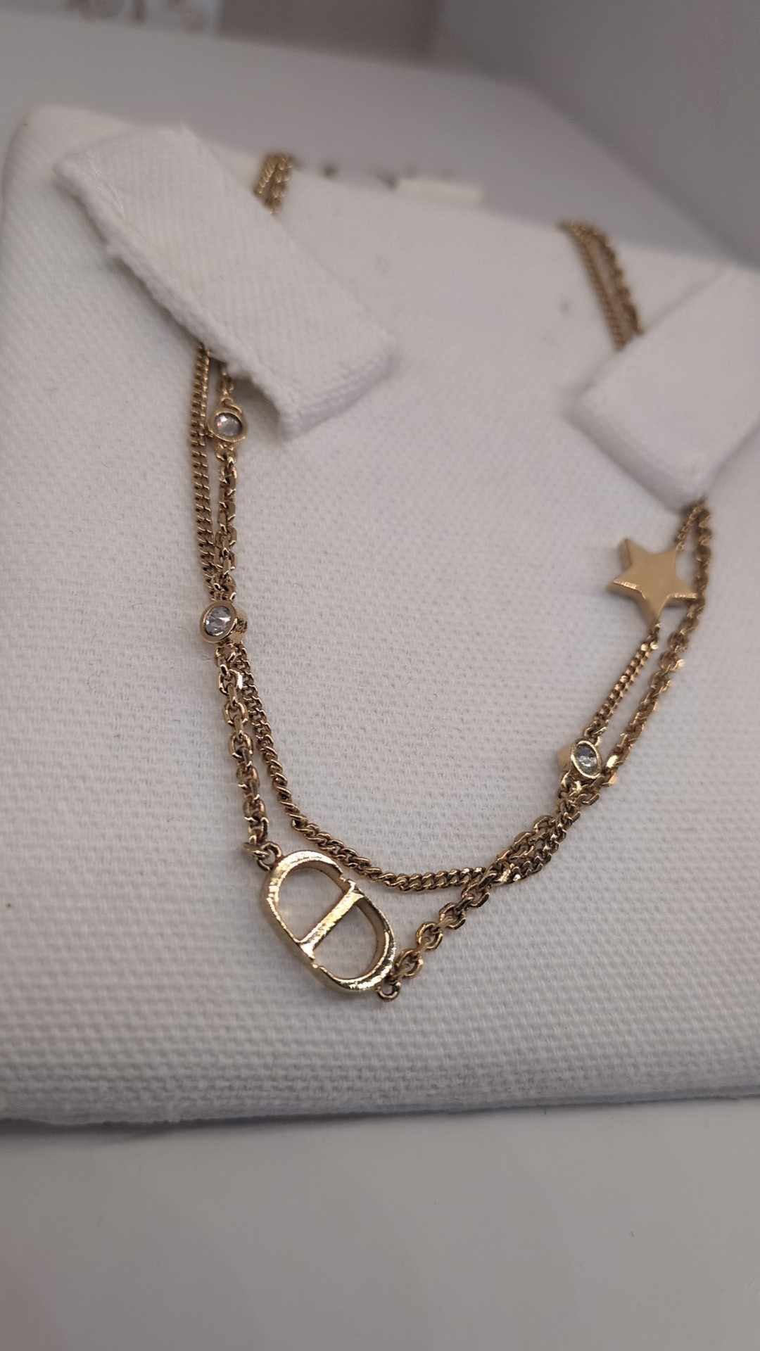 110580489 DIOR Petit CD Double Necklace
Gold-Finish Metal and Silver-Tone Crystals
