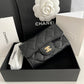 CHANEL
Black Quilted Caviar Leather Classic Flap Card Holder