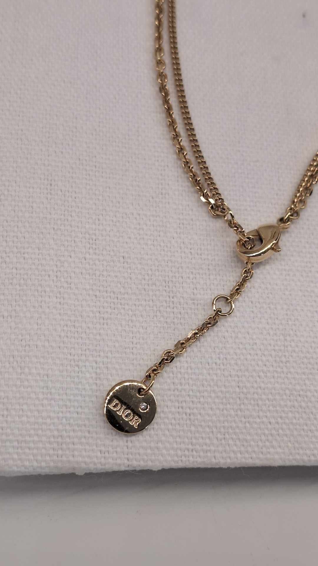 110580489 DIOR Petit CD Double Necklace
Gold-Finish Metal and Silver-Tone Crystals