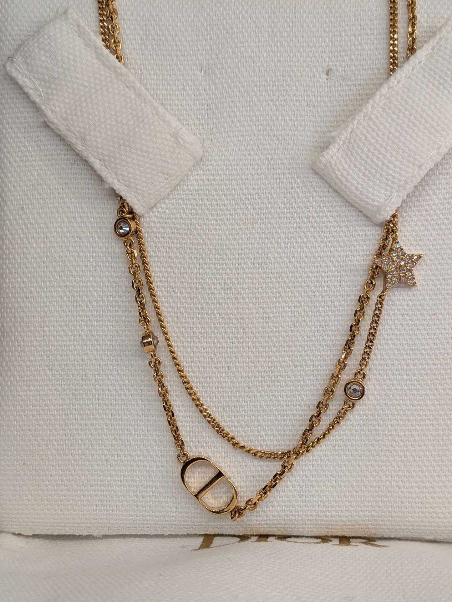 110580489 DIOR Petit CD Double Necklace
Gold-Finish Metal and Silver-Tone Crystals