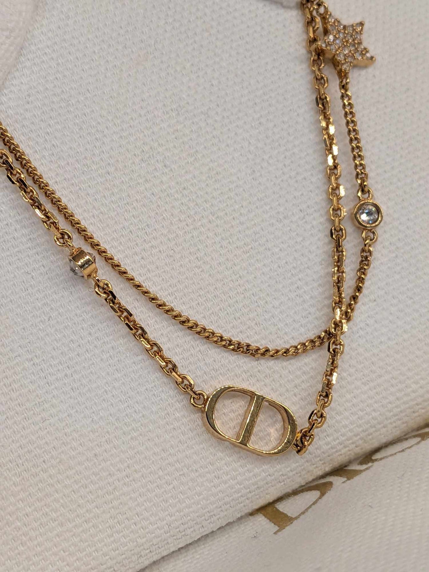 110580489 DIOR Petit CD Double Necklace
Gold-Finish Metal and Silver-Tone Crystals