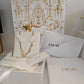 110580489 DIOR Petit CD Double Necklace
Gold-Finish Metal and Silver-Tone Crystals